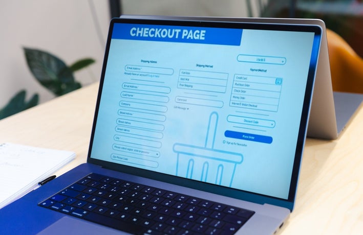 A laptop displaying a checkout page