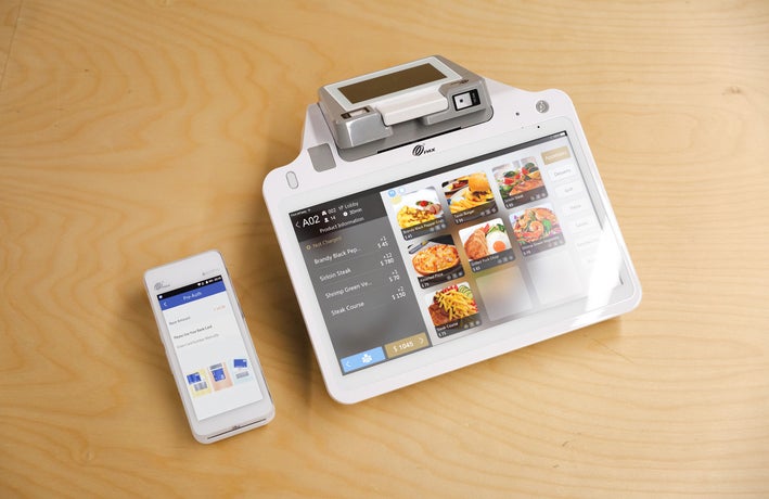 Image of a POS system comprised of a terminal and a card reader