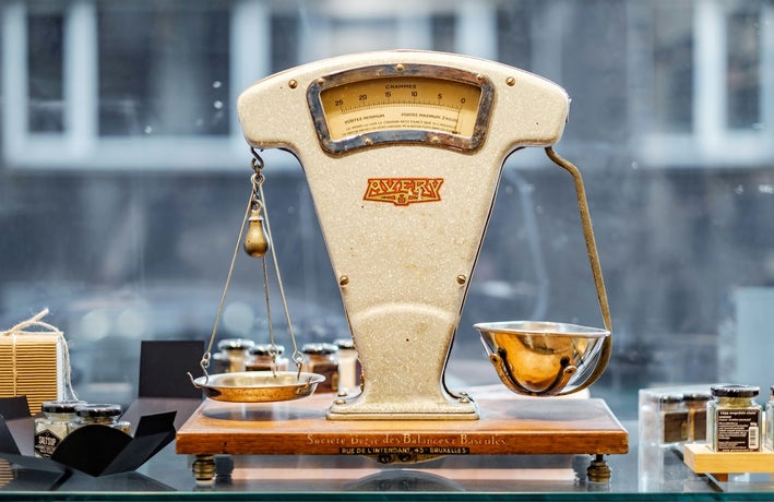 Old fashioned scales in front of a window