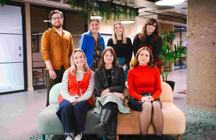 Startups.co.uk editorial team photo on sofa at Wenlock Works